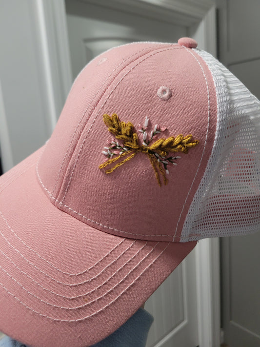 Trucker hat with wheat bow